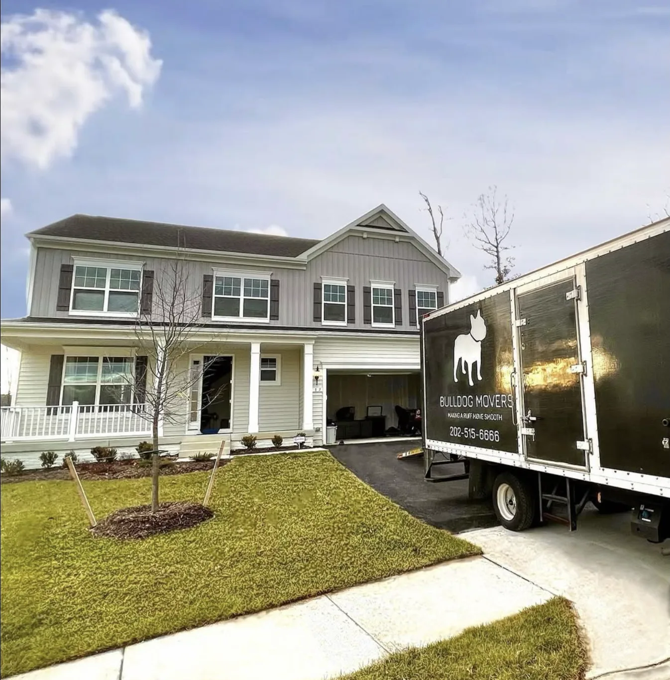 Bulldog moving truck parked at a residential move