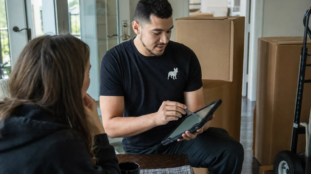 Bulldog Movers reviewing move details for a moving cost estimate