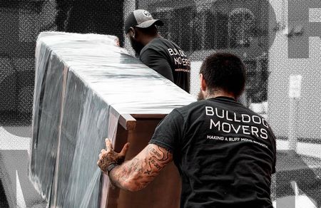 Bulldog Movers labor-only movers loading furniture for a DMV customer